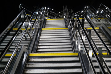 Stainless steel steps and walkway over railway line, Lincoln, UK.