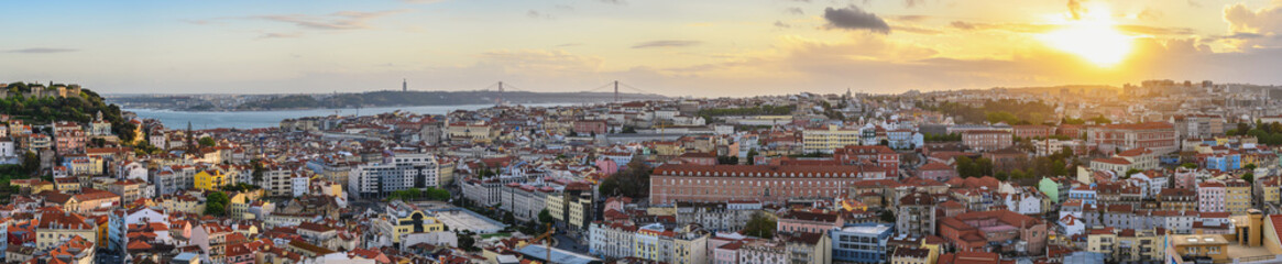 Naklejka na ściany i meble Lisbon Portugal aerial view sunset panorama city skyline at Lisbon Baixa district