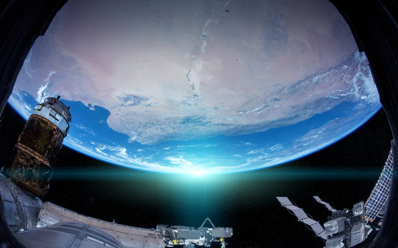 View of planet Earth from a space station window during a sunrise 3D rendering elements of this image furnished by NASA