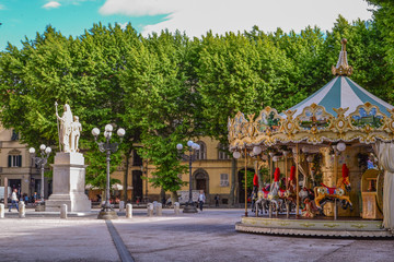 View with a merry-go-round in Italy, Lucca