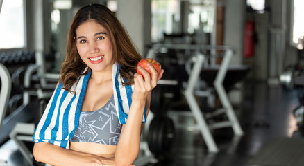 Fototapeta premium asian woman eating healthy apple. diet health lifestyle concept.