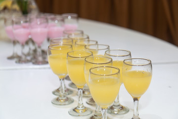 Yellow welcoming drinks at a wedding reception
