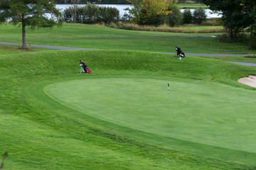 Freshly mowed lawn on the idyllic golf course