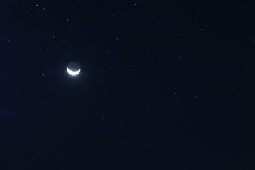 Obraz na płótnie Canvas New moon and stars in the sky