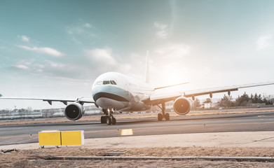 Airport runway apron and passenger aircraft