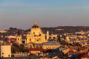 Fototapeta premium Aerial view of St. George's Cathedral and old town of Lviv in Ukraine. Lvov cityscape. View from bell tower of Church of Sts. Olha and Elizabeth