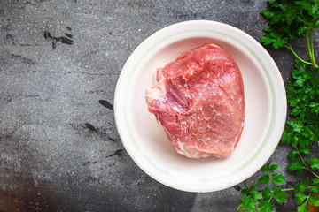 raw meat, a piece of pork (healthy eating) menu concept. food background. top view. copy space
