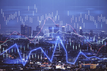 Financial graph on night city scape with tall buildings background double exposure. Analysis concept.