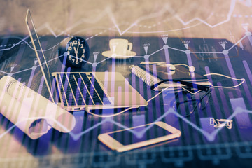 Stock market graph and table with computer background. Multi exposure. Concept of financial analysis.