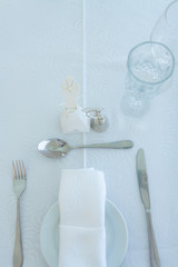 A table setting for a wedding reception