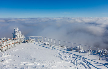 resting place above the clouds. Ceahlau mountain landscape in winter. Romania