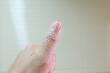 Close up hand on blur background.