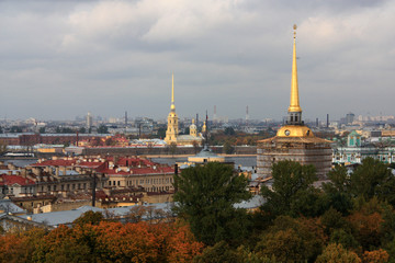 Skyline with the spires of the Admirality building and the Peter and Paul Cathedral - seen from the St. Isaac Cathedral in St. Petersburg, Russia