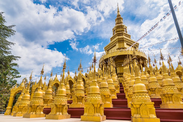 Naklejka premium Saraburi , Thailand - January, 2, 2020 : Golden pagoda at Wat pa sawang boon temple , Saraburi , Thailand