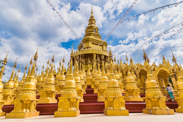 Naklejka premium Saraburi , Thailand - January, 2, 2020 : Golden pagoda at Wat pa sawang boon temple , Saraburi , Thailand
