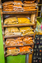 Powder spices in sachets from a moroccan market in the Medina of Fes