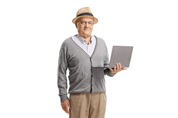 Senior gentleman standing with a laptop