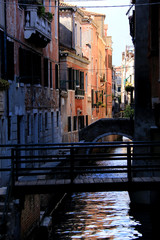Romantic little footbridges are leading tourists and locals across the narrow canals - Venice, Italy