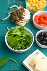 Salad ingredients, fresh and healthy nutrition. Vegetarian food. Top view. Menu, recipe book. Vertical frame.