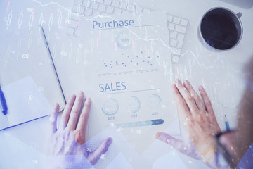 FOREX chart multi exposure with work table background.
