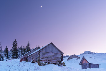 A charming evening with beautiful sky and mountain houses in the Ukrainian Carpathians