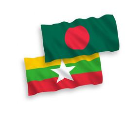 National vector fabric wave flags of Bangladesh and Myanmar isolated on white background. 1 to 2 proportion.