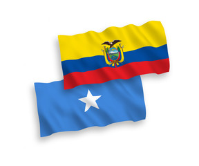 Fototapeta premium National vector fabric wave flags of Somalia and Ecuador isolated on white background. 1 to 2 proportion.