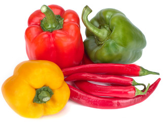 Assorted bell peppers and chili pepper isolated on a white background