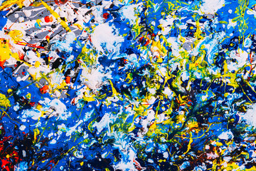 abstract expressonism. Picture painted using the technique of dripping. Mixing different colors red yellow blue white black.