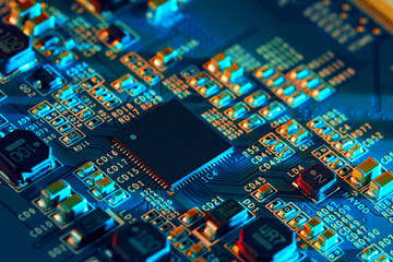 Electronic circuit board with electronic components such as chips close up. The concept of the...