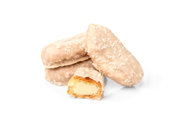 Fototapeta na wymiar Coconut eclairs or custard cookies isolated on white background.