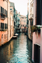Fototapeta na wymiar VENICE, ITALY - December 21, 2017 : View of water street and old buildings in Venice, ITALY