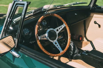 Wall murals Vintage cars Wooden steering wheel, vintage car