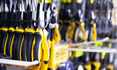 Pliers on a shelf in a hardware store