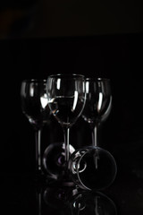 Abstract ink drop to water in to glass wine