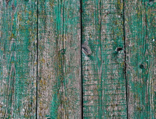 Obraz premium Old pier. Shabby green wooden background. Rustic style. Favorite wallpaper. The texture of wood boards.