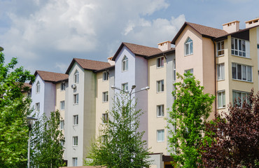 Beautiful cozy apartment building in the summer. Residential complex.