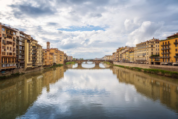 Fototapeta na wymiar Panoramic day view of Ponte Santa Trinita (Holy Trinity Bridge) over Arno River in Florence, Italy.