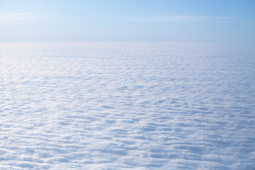 View from a flight. Cloud texture in blue color.