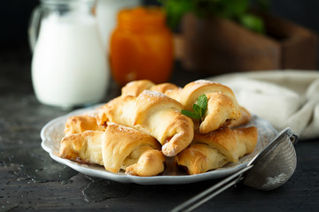 Homemade croissants or sweet rolls with jam