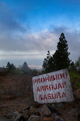 Do not litter sign in the forrest on the island of Tenerife, with copy space.