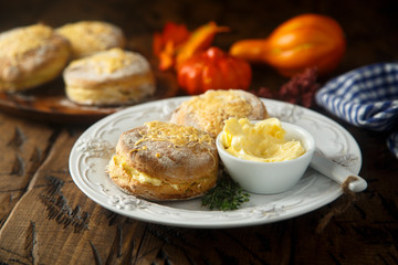 Homemade pumpkin scones with butter