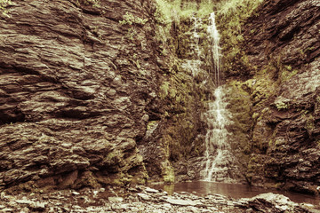 Little waterfall in mountains, Norway.