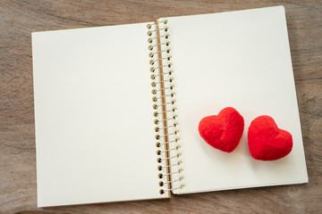 Couple Heart shaped on Note book paper. Day 14 meets Valentine Day. Red heart is the promise of love. using as background Valentine concept with copy spaces for you