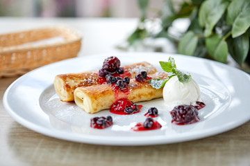 pancakes with berries and ice cream