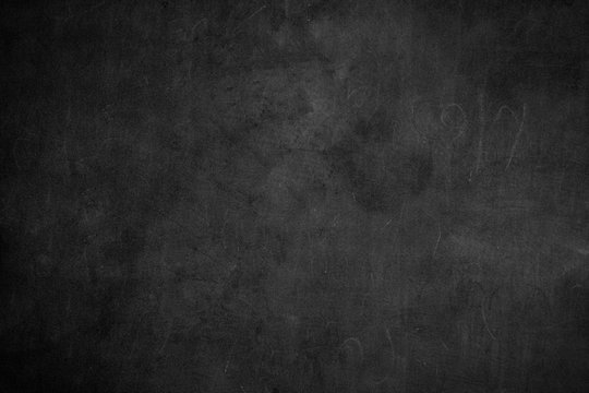 Blank front Real black chalkboard background texture in college concept for back to school kid wallpaper for create white chalk text draw graphic. Empty old back wall education blackboard.