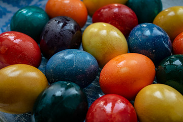 Eggs that found a rabbit at Easter of different colors in a vase.