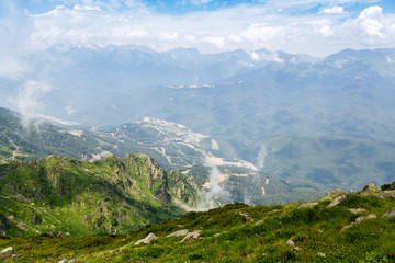 Beautiful mountain landscape in summer. Mountains with flowering Alpine plants.