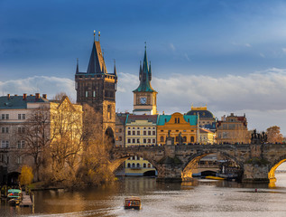 Prague, Czech Republic - Beautiful golden sunset and blue sky at the world famous Charles Bridge...