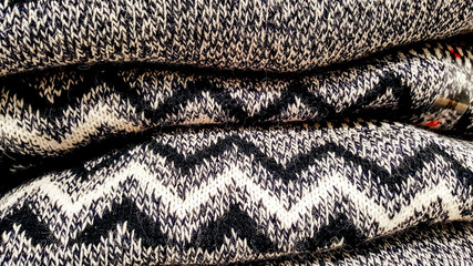 woolen warm winter clothes for sale in a retail store